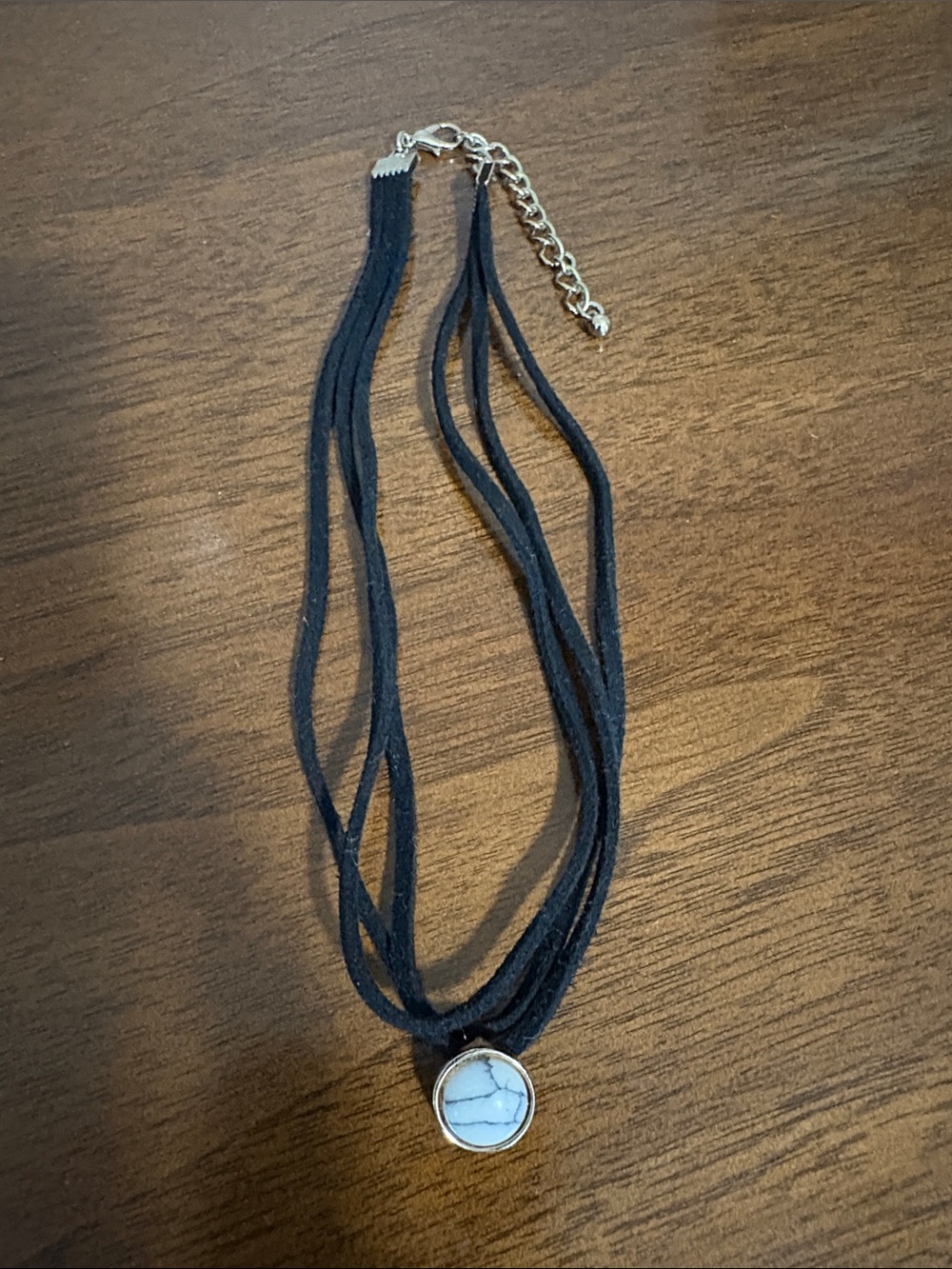 Multi-Strand Black Suede Choker with White Stone Pendant